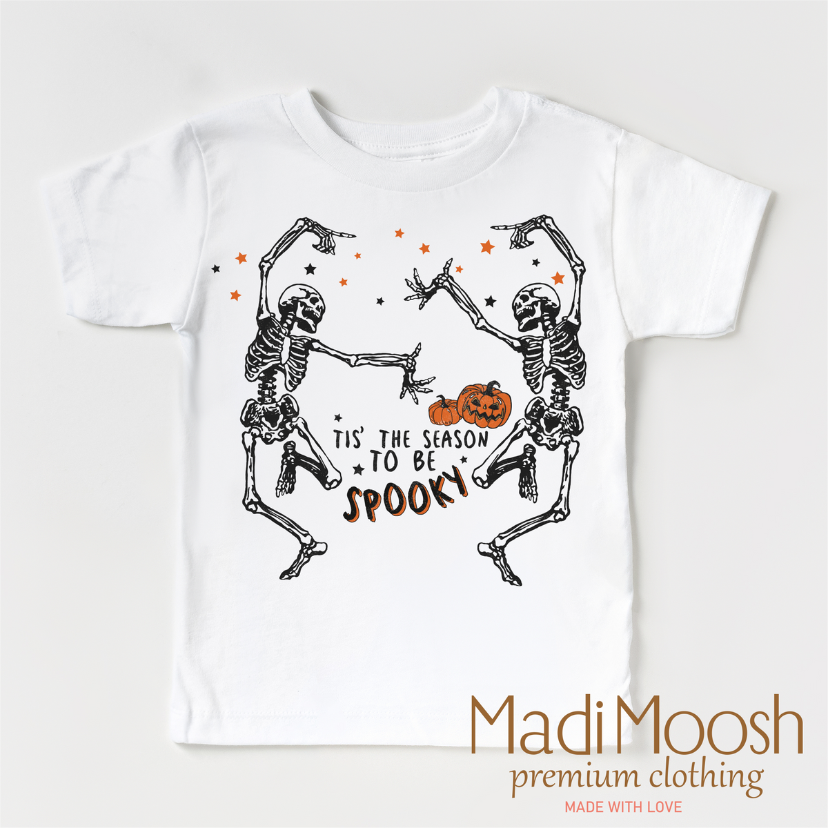 Tis The Season To Be Spooky design on a white short sleeve T-shirt.