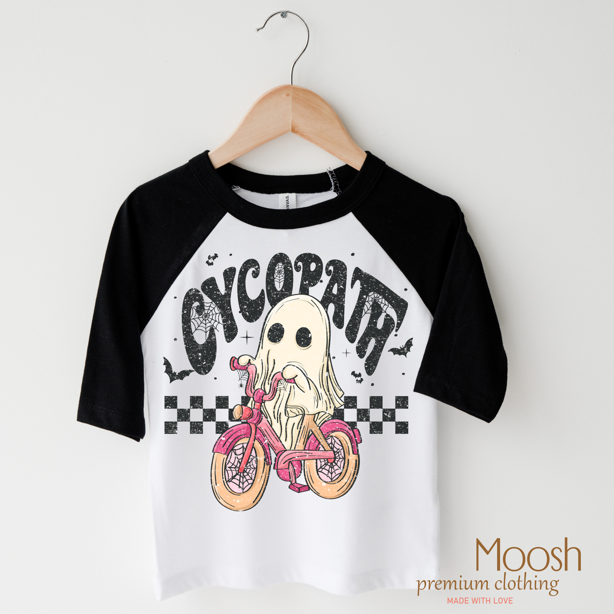 Cycopath Girls Ghost design on a raglan shirt with black sleeves.