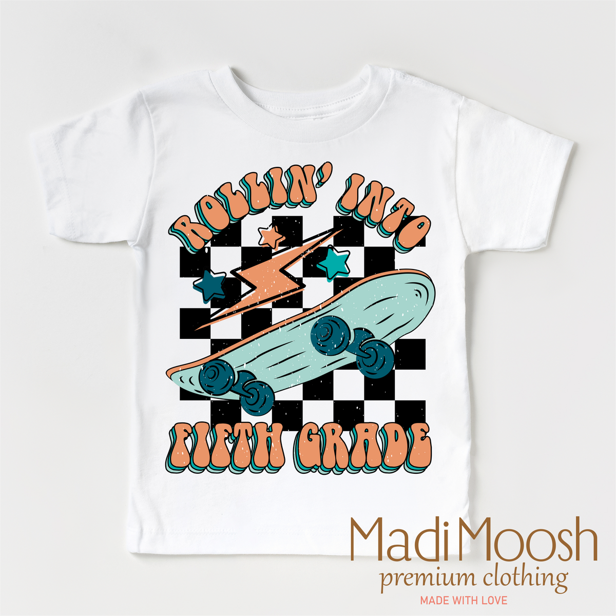 Rollin' Into 5th Back To School design on a white short sleeve T-shirt.