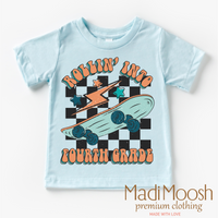 Rollin' Into 4th Back To School design on a blue garment.