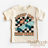 Rollin' Into 3rd Back To School design on a natural kids T-shirt.