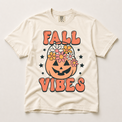Fall Vibes floral jack-o'-lantern graphic on an ivory Comfort Colors T-shirt