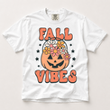 Fall Vibes floral jack-o'-lantern graphic on a white Comfort Colors T-shirt