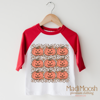 Pumpkin Season design on a raglan shirt with red sleeves.