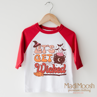 Let's Get Wicked Witch design on a raglan shirt with red sleeves.