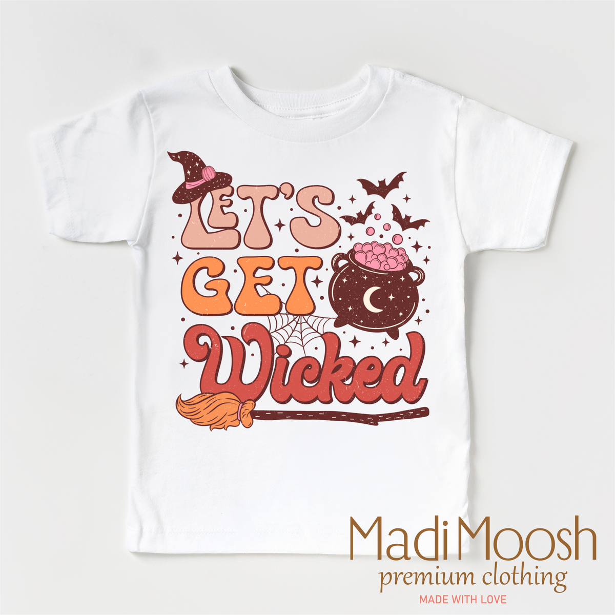Let's Get Wicked Witch design on a white short sleeve T-shirt.