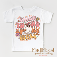 Think Thighs And Spooky Vibes design on a white short sleeve T-shirt.