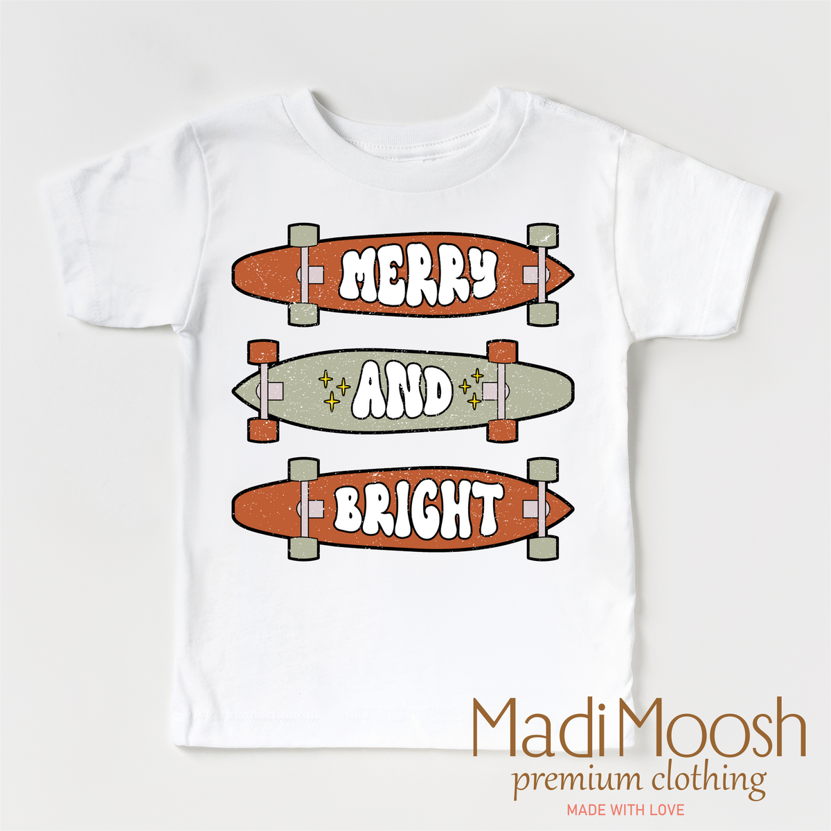Merry And Bright Skater Christmas graphic T-shirt by Madi Moosh