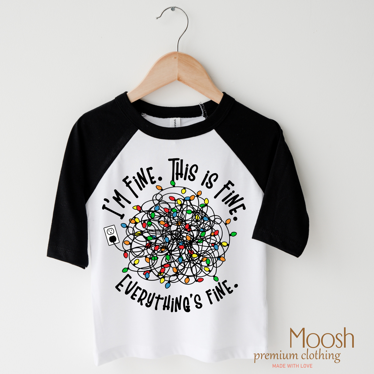 I'm Fine design on a raglan shirt with black sleeves.