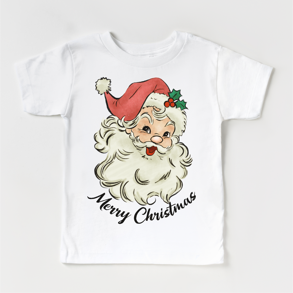Retro Merry Christmas Santa design on a white garment.