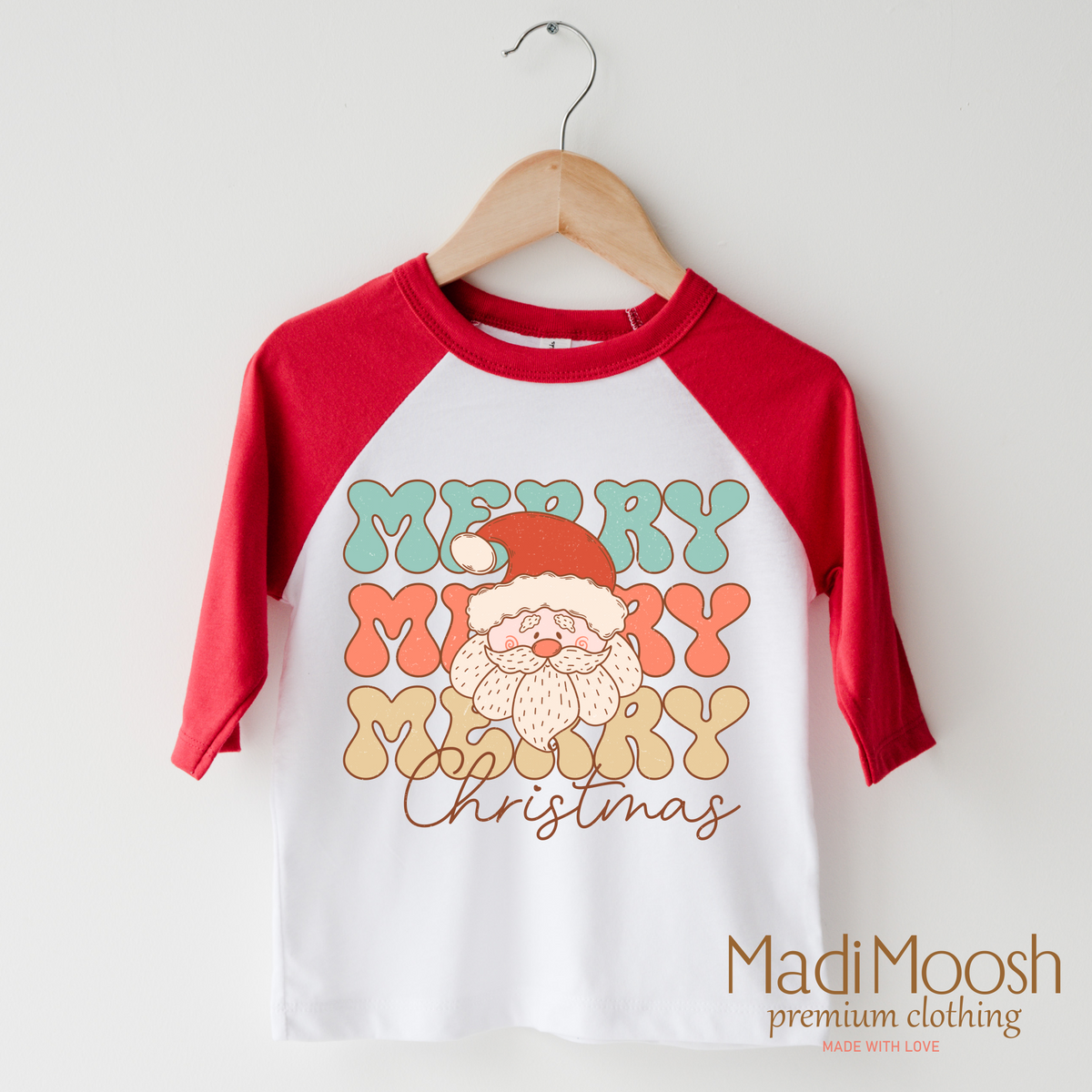 Merry Christmas Santa design on a raglan shirt with red sleeves.