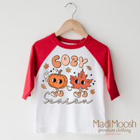 Cozy Season Fall design on a raglan shirt with red sleeves.