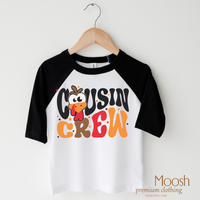 Cousin Crew design on a raglan shirt with black sleeves.