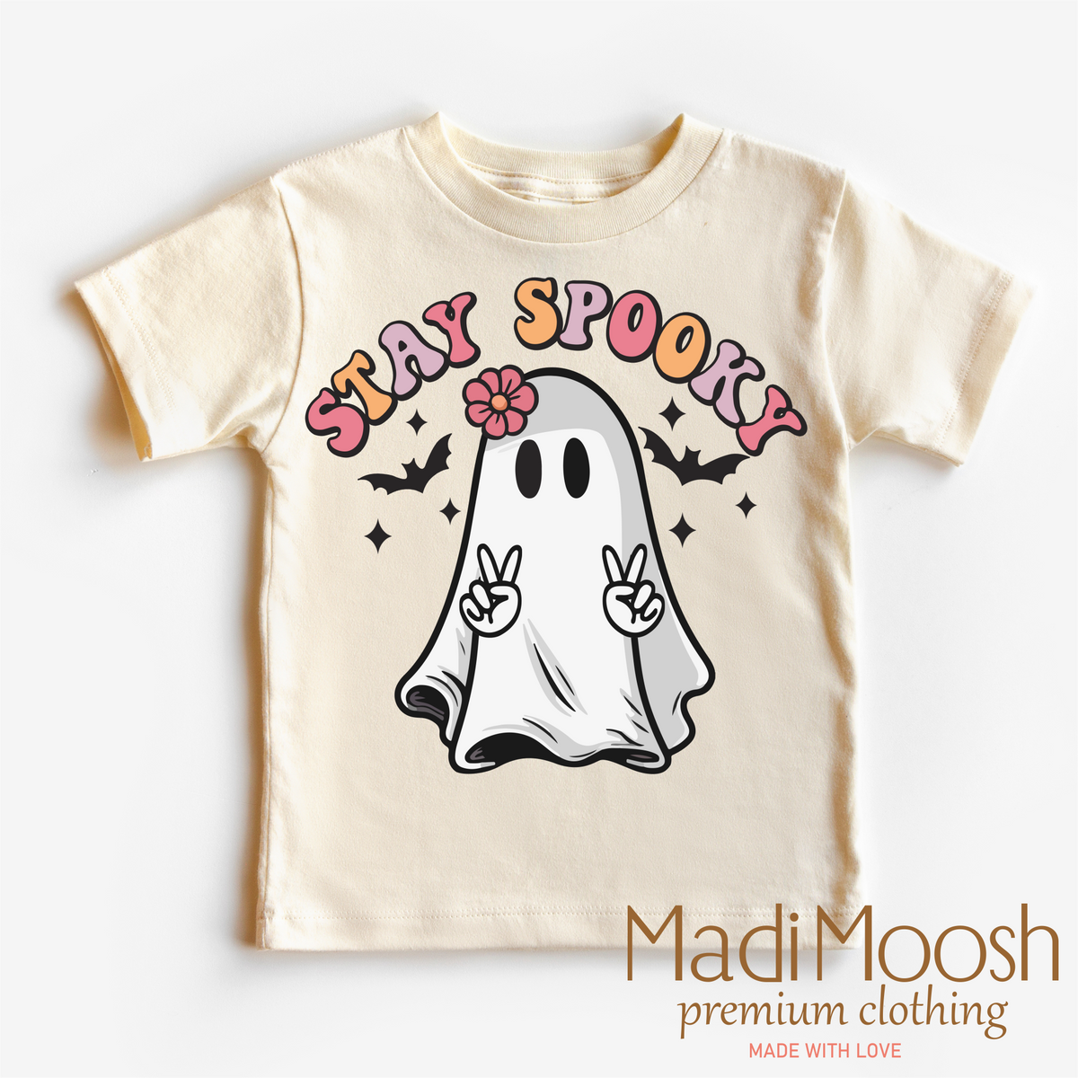 Stay Spooky design on a natural kids T-shirt.