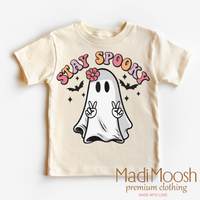 Stay Spooky design on a natural kids T-shirt.