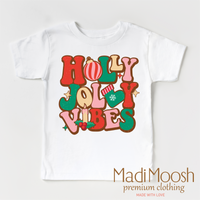 Holly Jolly Vibes design on a white short sleeve T-shirt.