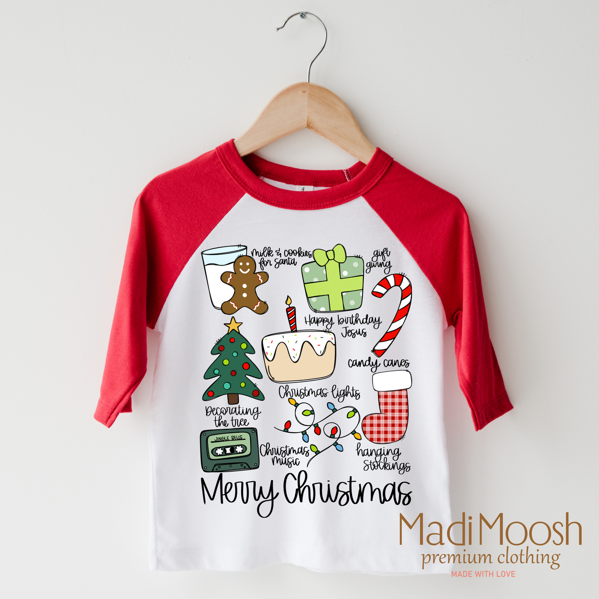 Merry Christmas design on a raglan shirt with red sleeves.