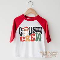 Christmas Cousin Crew design on a raglan shirt with red sleeves.