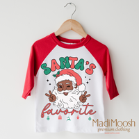 Black Santa design on a red-accented shirt.