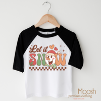 Let It Snow design on a black-accented shirt.