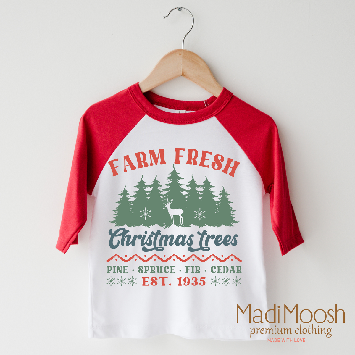 Farm Fresh Christmas Trees design on a red-accented shirt.