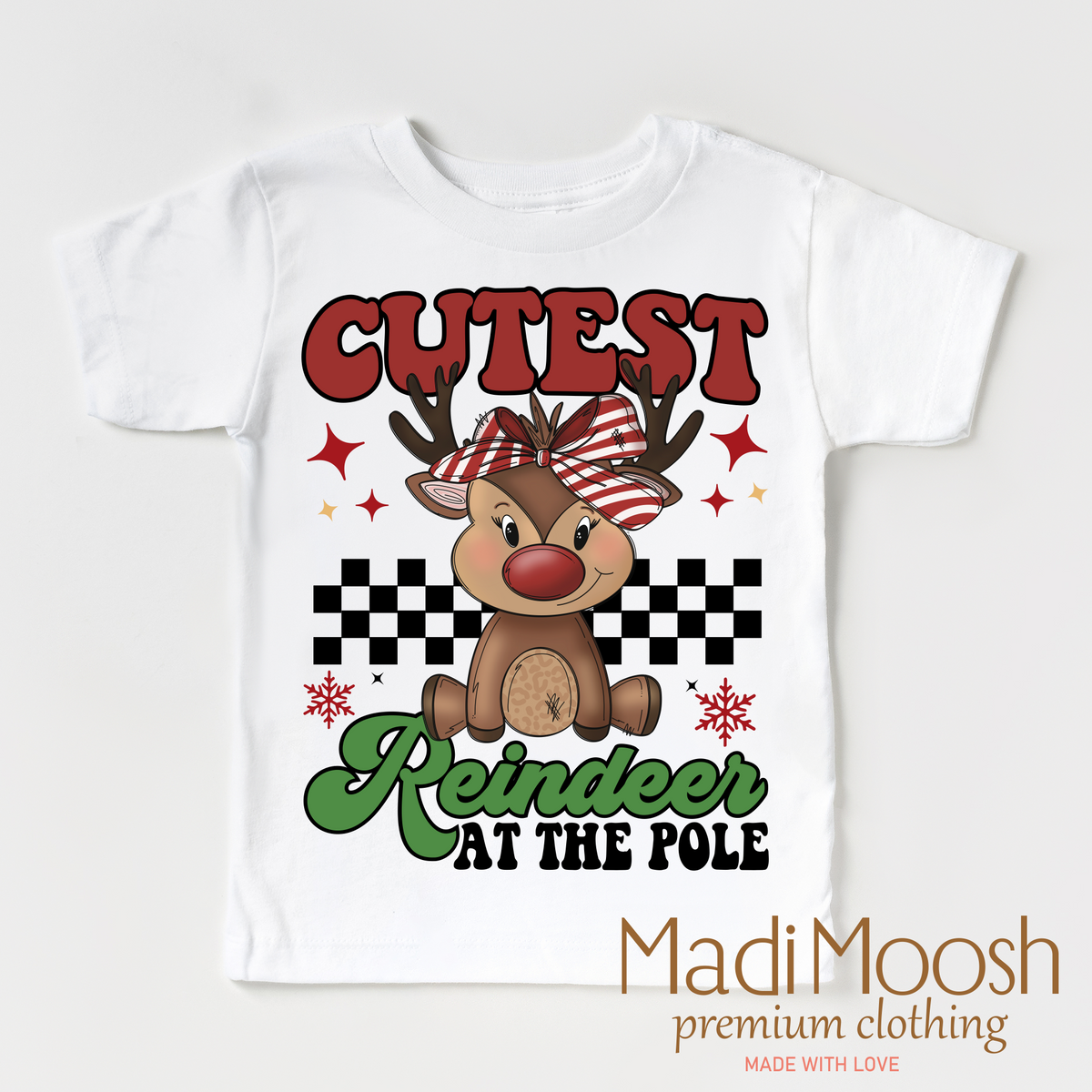 Cutest Reindeer At The Pole, Christmas graphic T-shirt by Madi Moosh