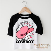 Cupid Find Me A Cowboy Valentine's design on a black-accented shirt.