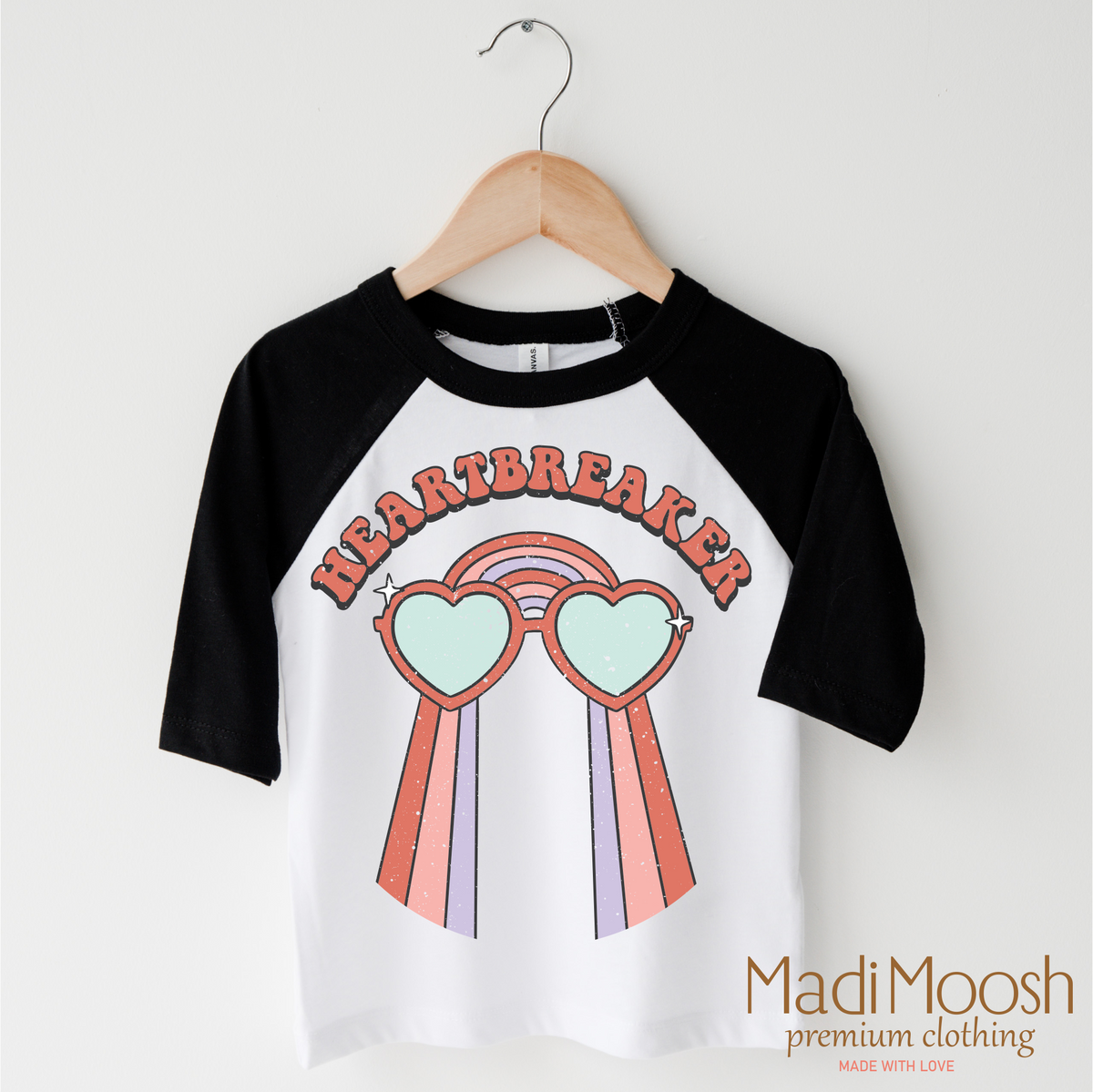 Heartbreaker Valentine's Day design on a black-accented shirt.