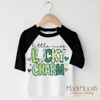 Lucky Charm St. Patrick's Day design on a black-accented shirt.