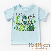 Lucky Charm St. Patrick's Day design on a blue garment.
