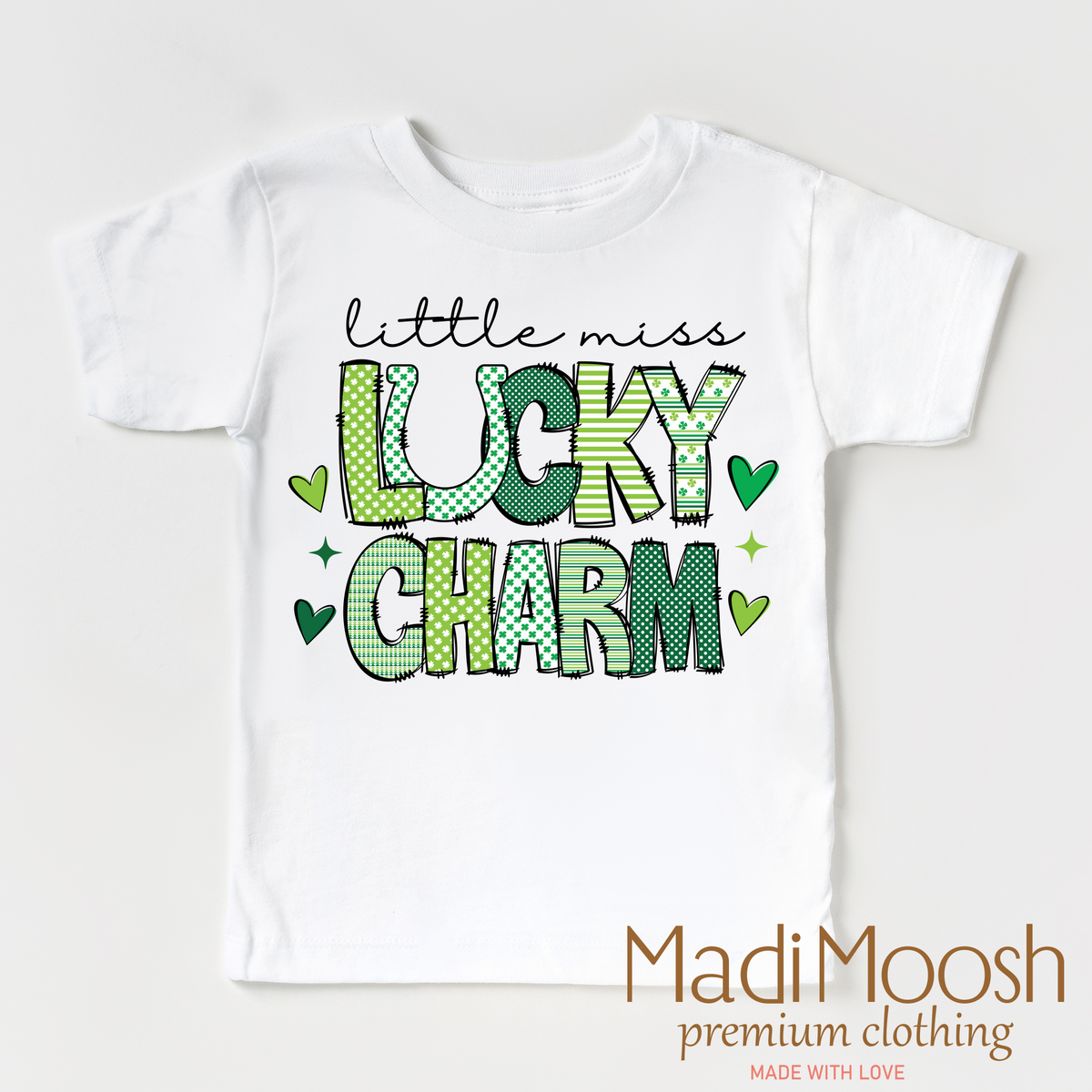 Lucky Charm St. Patrick's Day design on a white garment.