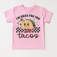 I'm Here For The Tacos Cinco De Mayo design on a pink garment.