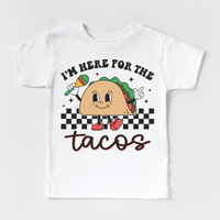 I'm Here For The Tacos Cinco De Mayo design on a white garment.