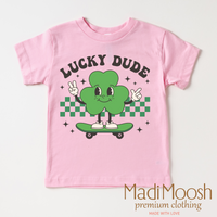 Lucky Dude St. Patrick's Day design on a pink garment.