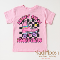 Rollin' Out Of 2nd Grade Last Day Of School design on a pink garment.