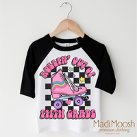 Rollin' Out Of 5th Grade Last Day Of School design on a black-accented shirt.