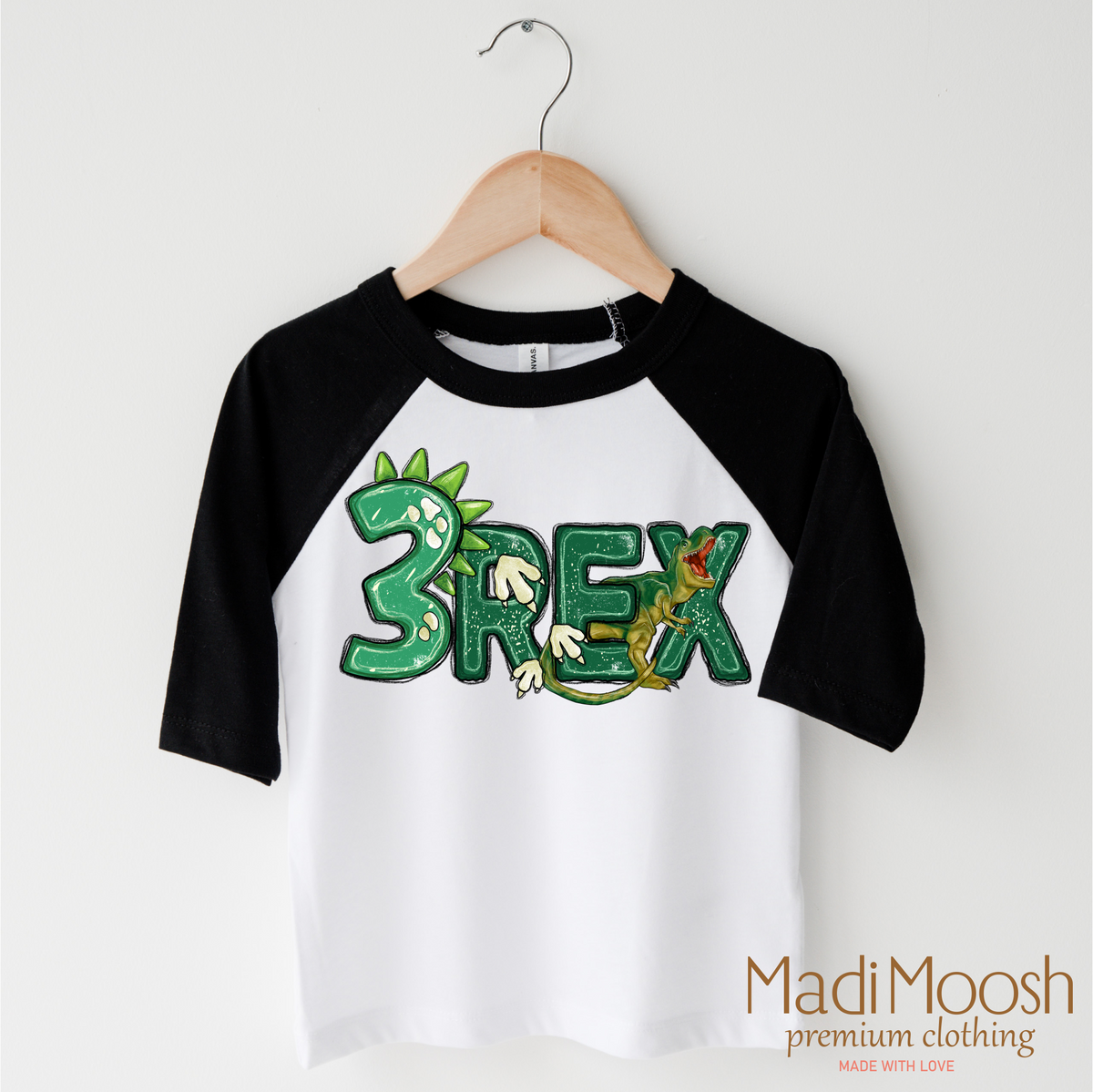 Three Rex Dinosaur Birthday design on a black-accented shirt.