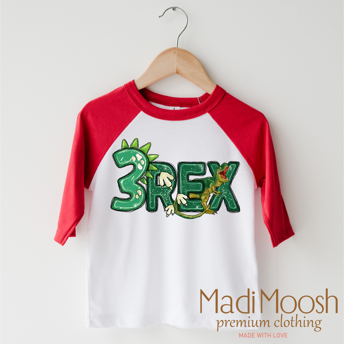 Three Rex Dinosaur Birthday design on a red-accented shirt.