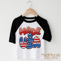 Made In The USA America design on a black-accented shirt.