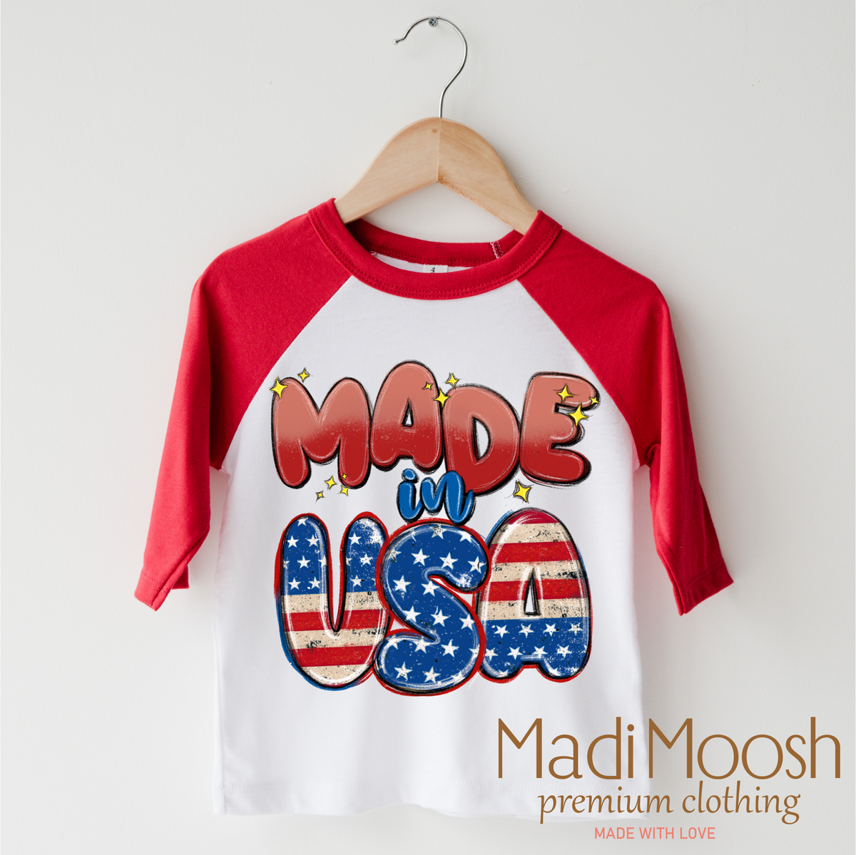 Made In The USA America design on a red-accented shirt.