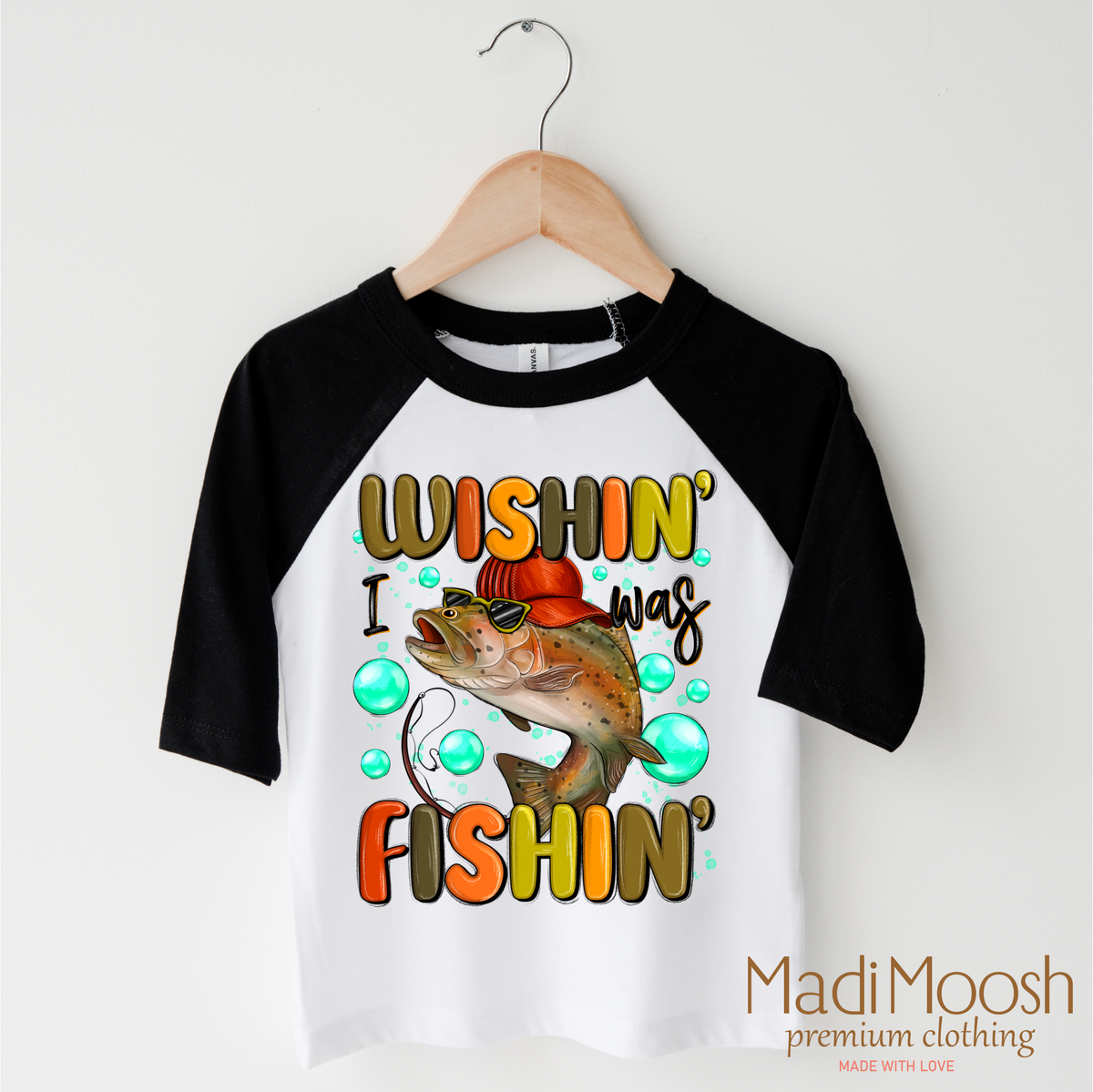 Wishing I Was Fishing design on a black-accented shirt.