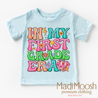 In My 1st Grade Era Back To School design on a blue garment.