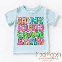 In My 4th Grade Era Back To School design on a blue garment.