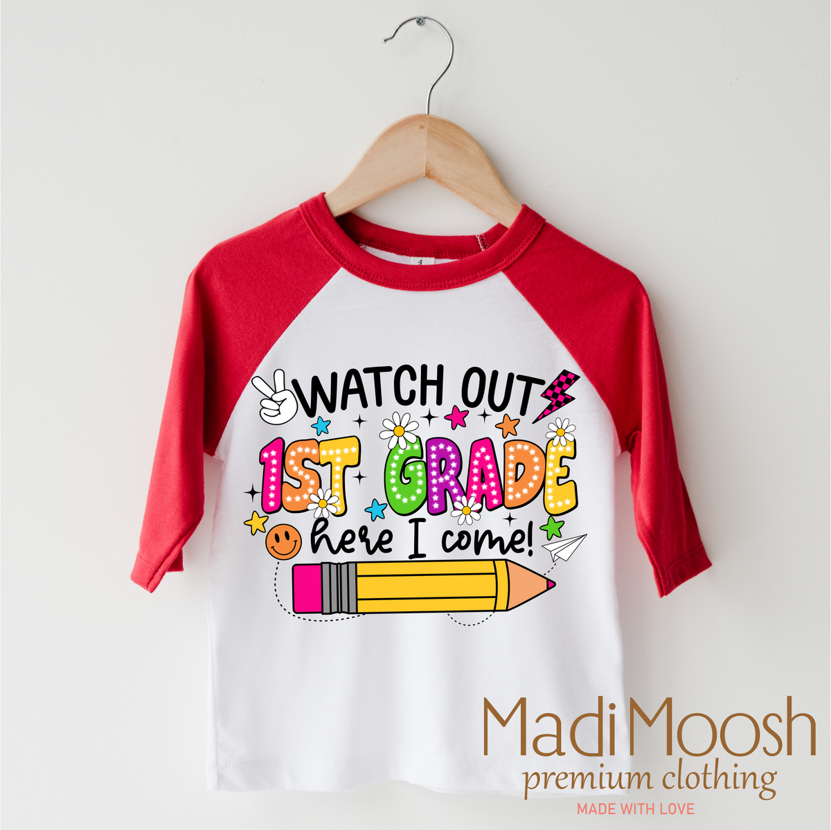 Watch Out 1st Grade Here I Come design on a red-accented shirt.