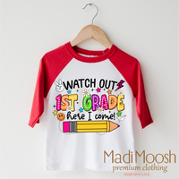 Watch Out 1st Grade Here I Come design on a red-accented shirt.