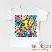 First Grade Lightning Bolt Back To School design on a white garment.