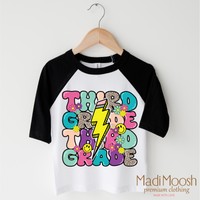 Third Grade Lightning Bolt Back To School design on a black-accented shirt.