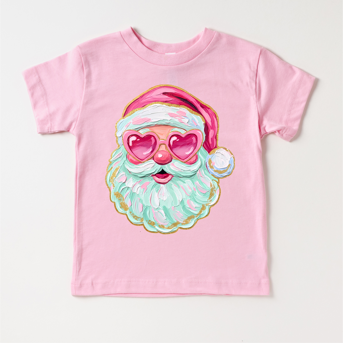 Santa With Heart Shaped Glasses Christmas design on a pink garment.