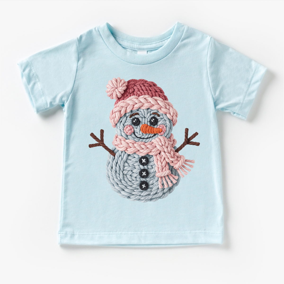 Faux Woven Snowman Christmas design on a blue garment.