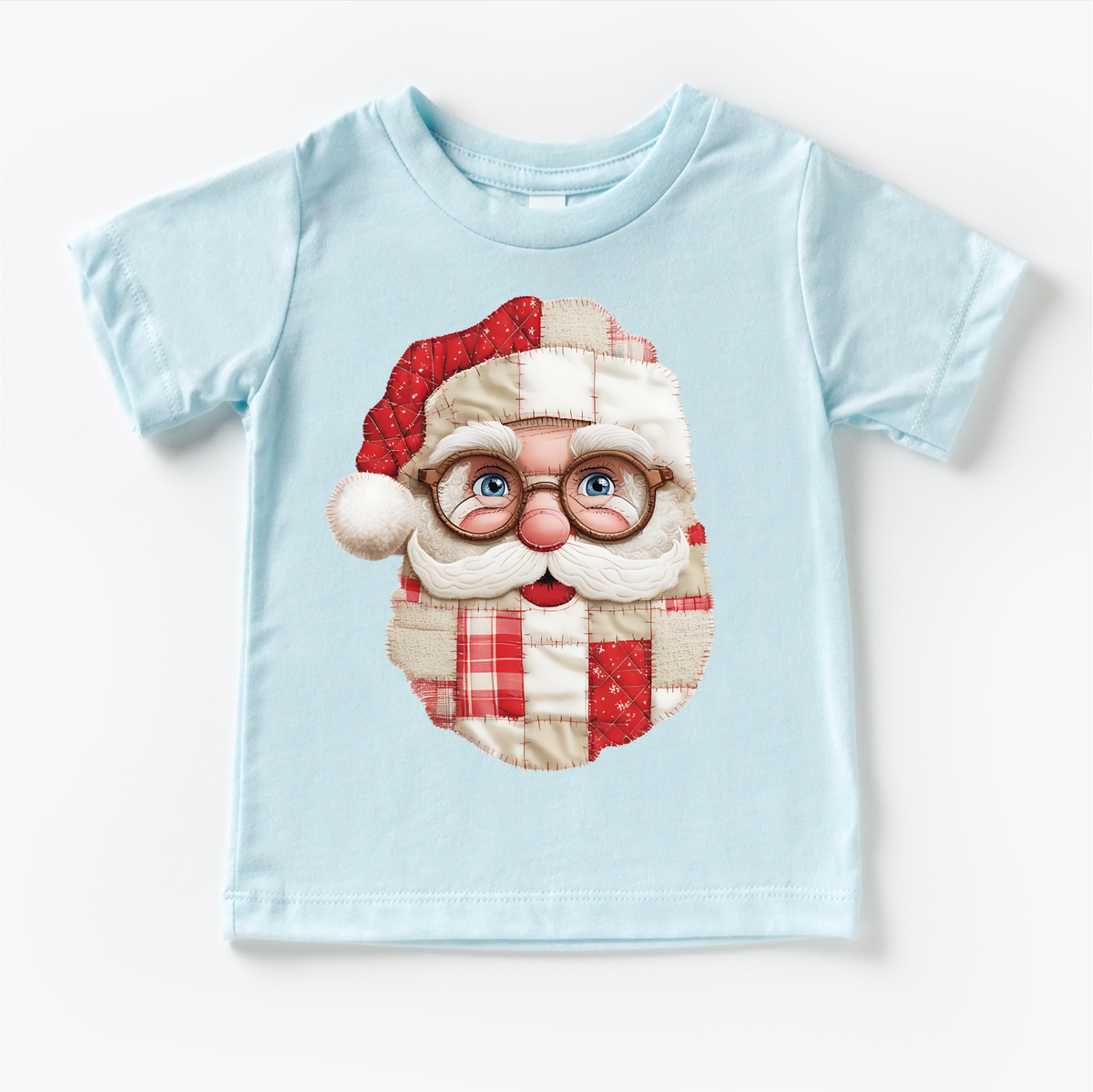 Faux Santa Patchwork Christmas design on a blue garment.